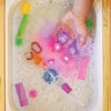 Glo Pals - sensorische lichtgevende blokjes voor in bad of sensorisch spel - Sesamstraat Abby Cadabby - 4 stuks