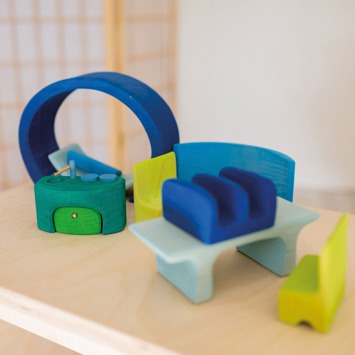 Grimm's - Blauw-groen mobiel poppenhuis to-go