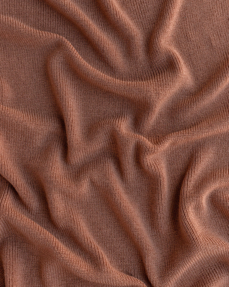 Hvid Wollen babydeken Felix Terracotta - detail