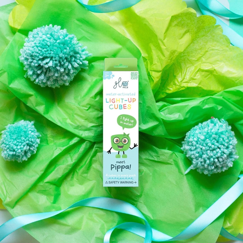 Verpakking van Glo Pals Pippa op een groene feestelijke achtergrond