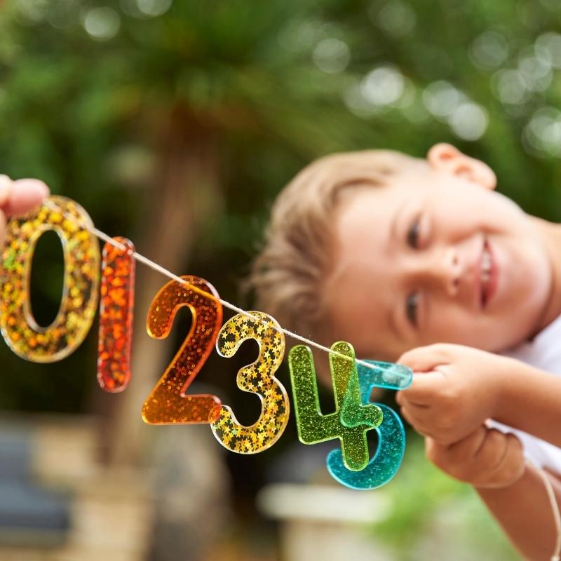 Regenboog glitter cijfers aan lijn 