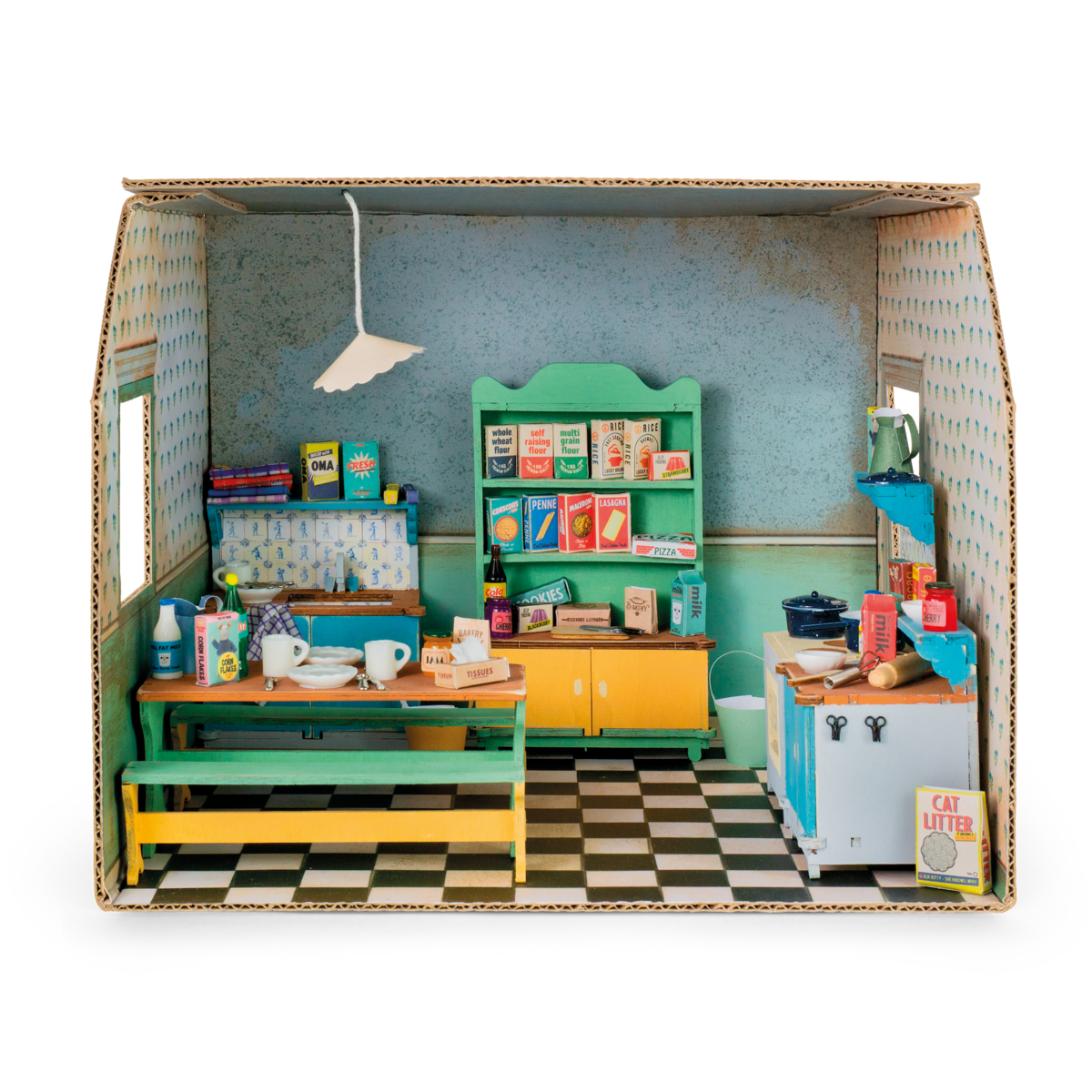 Ingerichte miniatuur keuken met pannen