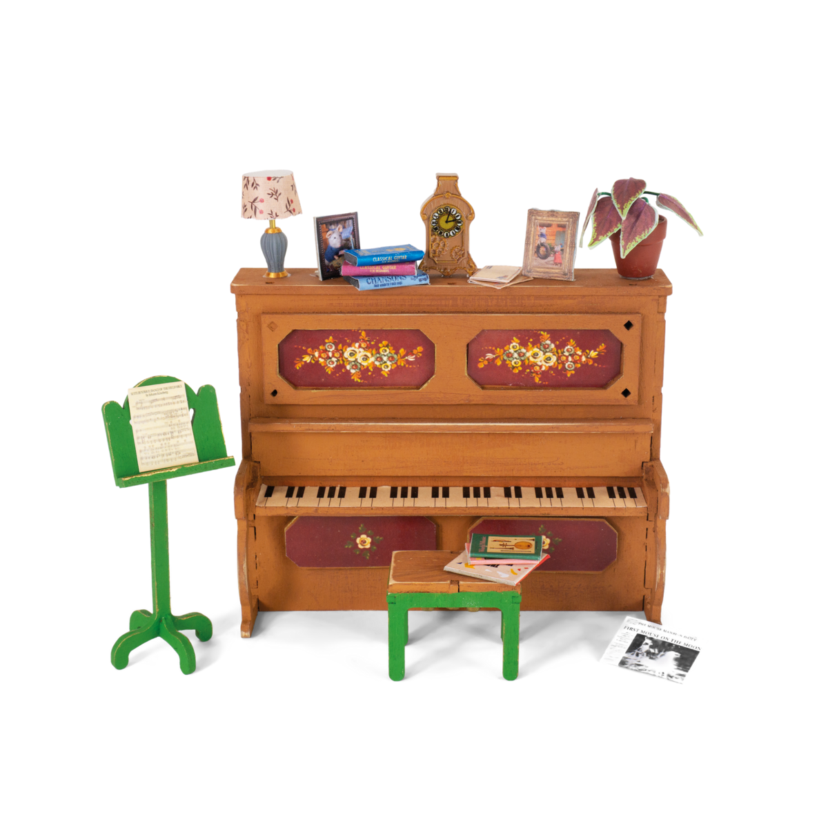 Miniatuur piano met muziekstandaard