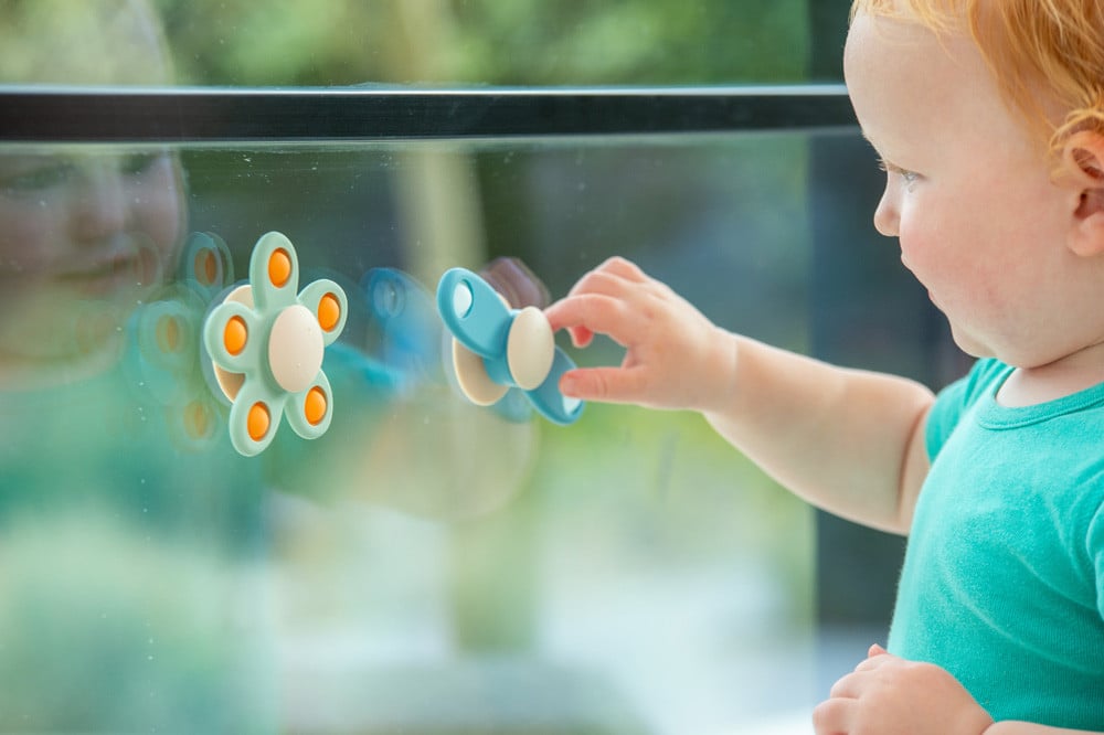TickiT - Silisoft Bloem Spinner (neutrale Kleuren)