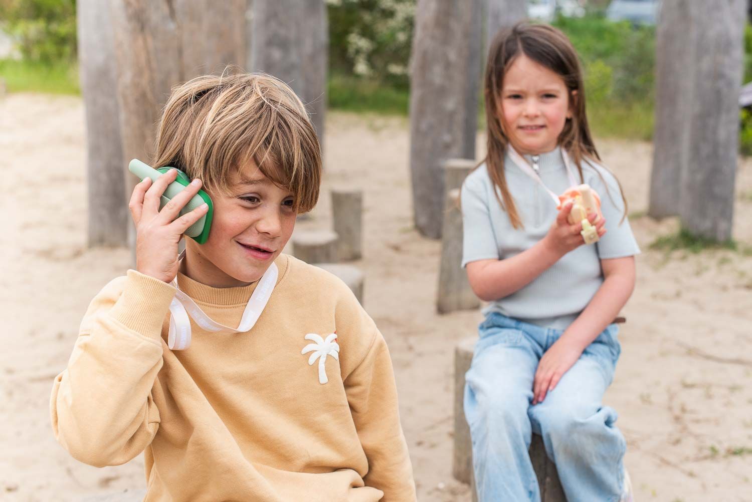 The Zoofamily Zoo Walkie Talkie Dino roze x Dino groen