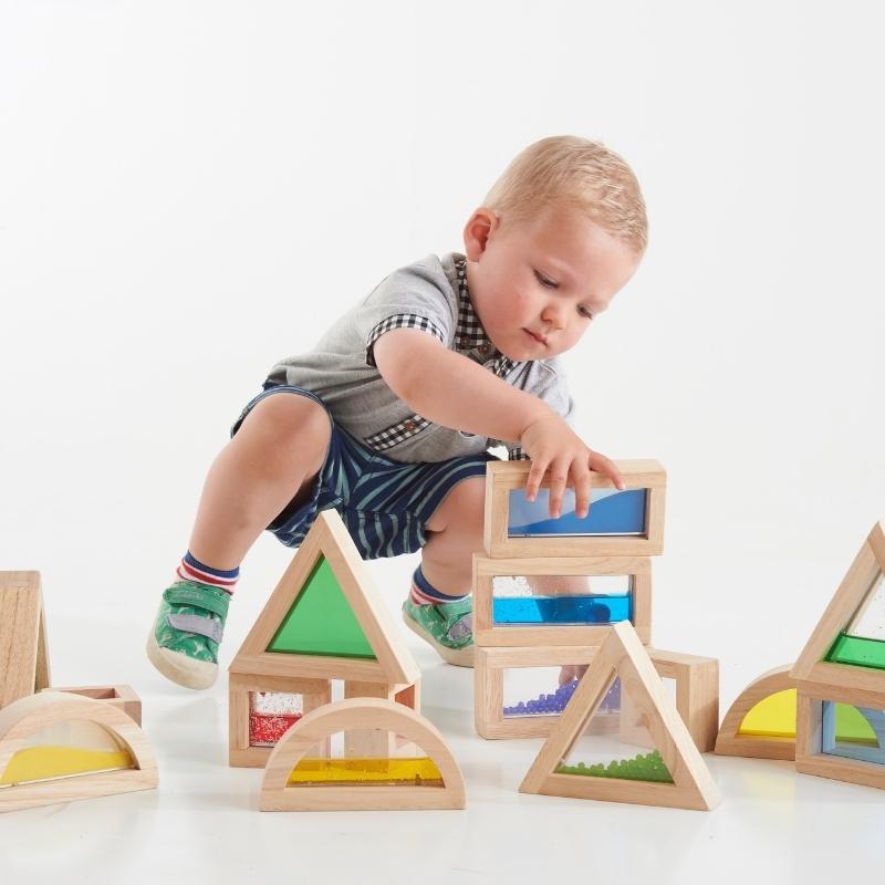 TickiT - 16 houten sensorische blokken gevuld met gekleurd zand, water en kralen