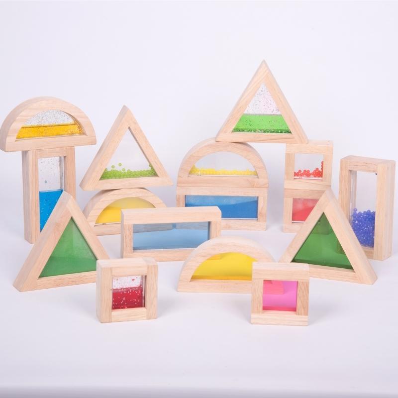 TickiT - 16 houten sensorische blokken gevuld met gekleurd zand, water en kralen